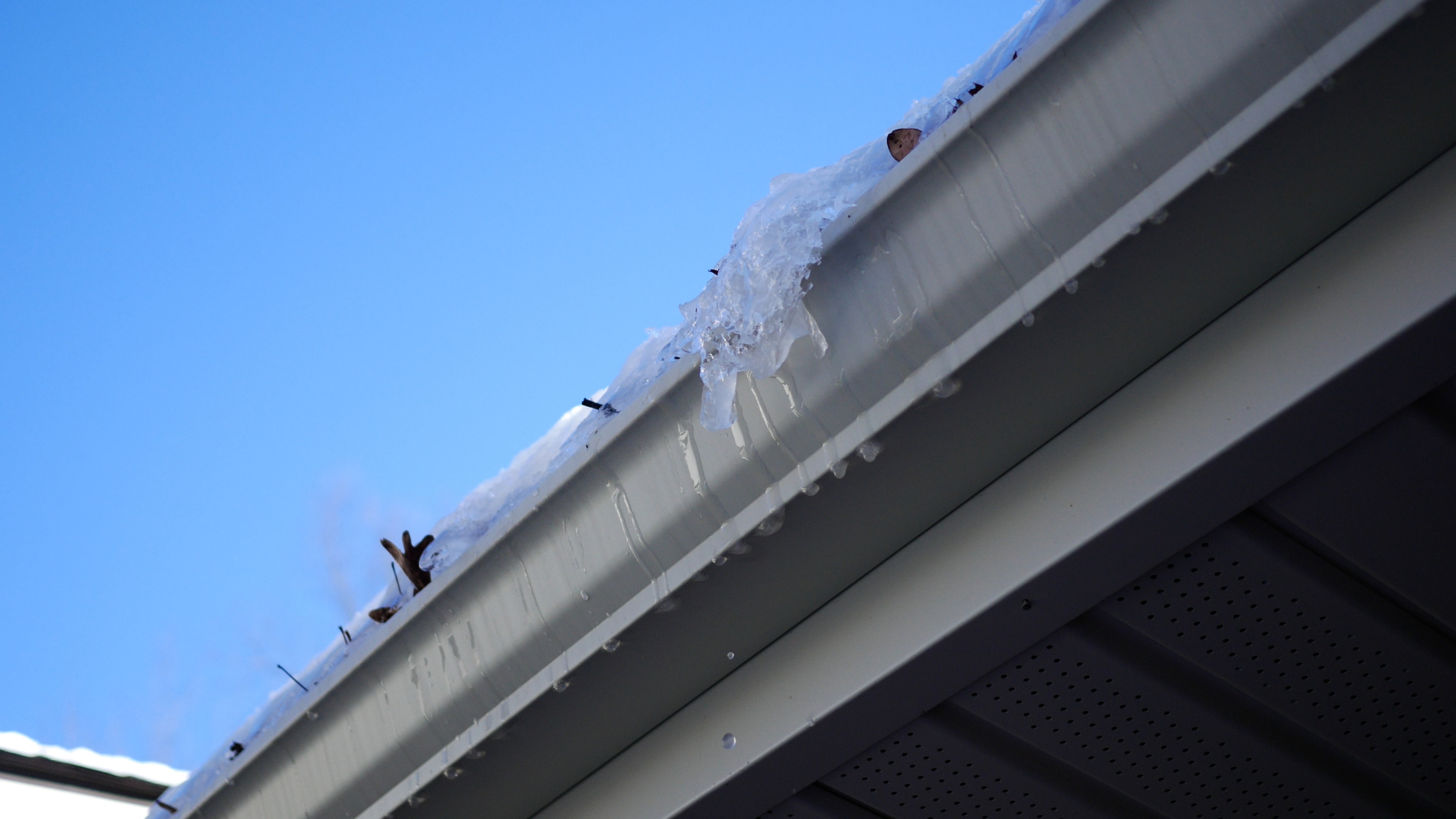fix attic ventilation prevent ice dams Pittsburgh